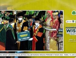 Reki Wahyudi Meraih Prestasi di Wisudawan Wisudawati UIR Dari Desa Banjar Padang Kecamatan Kuantan Mudik