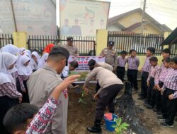 Polres Kuansing Laksanakan Program Unggulan Kapolda Riau Green Policing di SDN 019 Sungai Jering